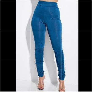 It's a Set.. White crop top and Teal pants set(white and Teal)